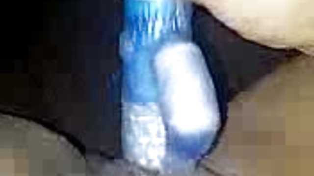 Playing with her sex toy